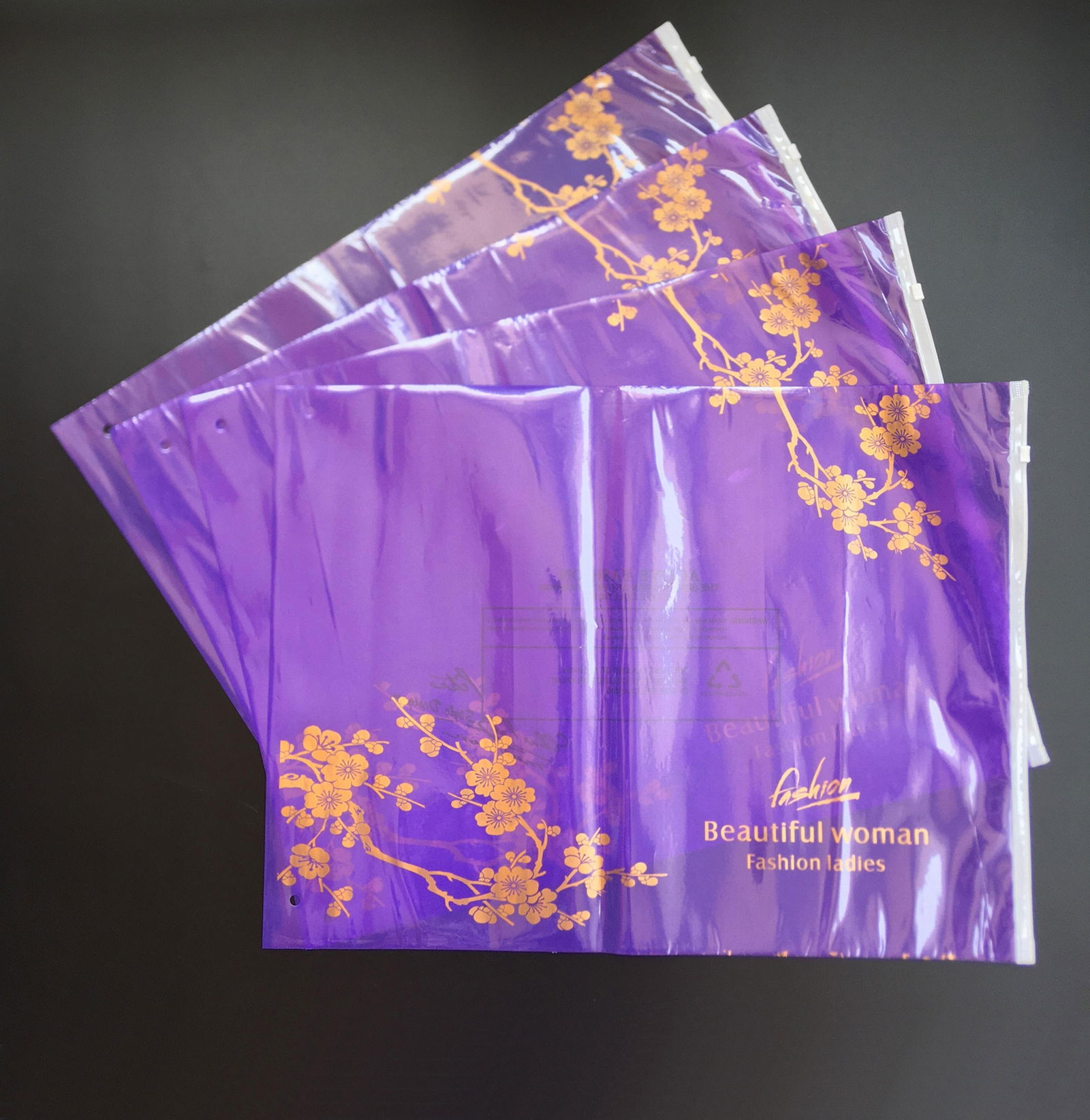 Custom logo plastic packaging bags with zipper for clothing manufacturer