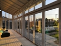 aluminium frame glass bi-folding door price