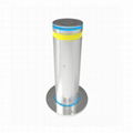 Automatic rising hydraulic bollard