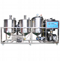 Vegetable oil refinery machine with vacuum tank