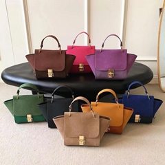Female vegan leather wing bag 