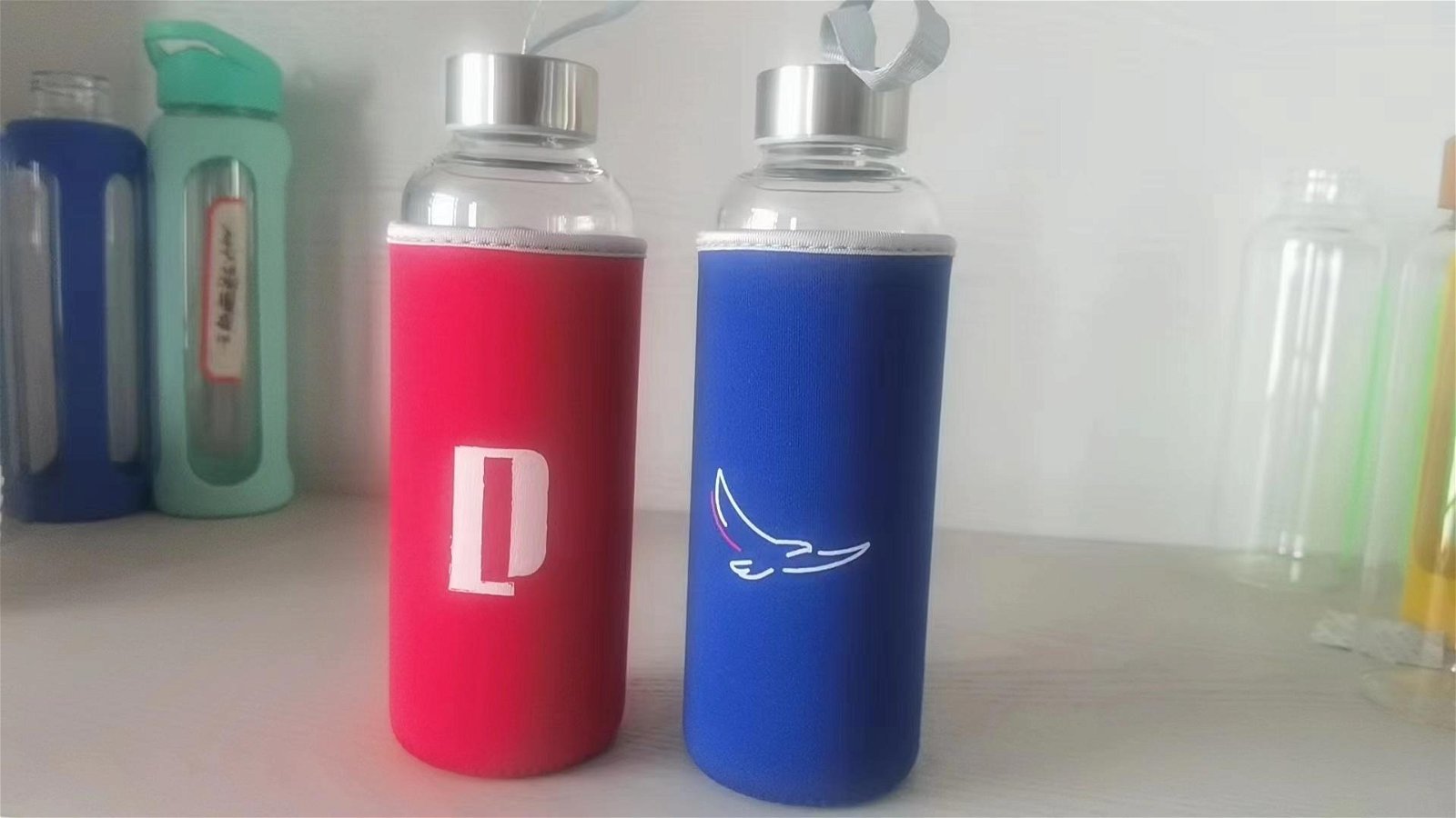 glass water bottle with pouch