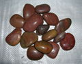 Red pebbles, landscaping stones, garden