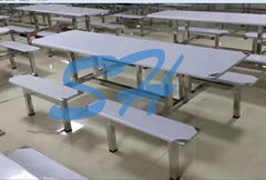 Stainless steel fast food tables and chairs in the school canteen