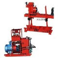 Fully hydraulic tunnel drilling rig for