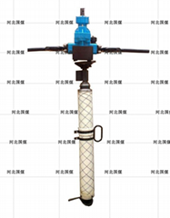 Pedestal support pneumatic handheld drilling rig