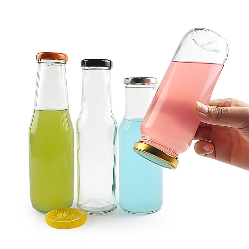 Empty clear glass tomato sauce beverage juice bottles with sealed metal cap 3