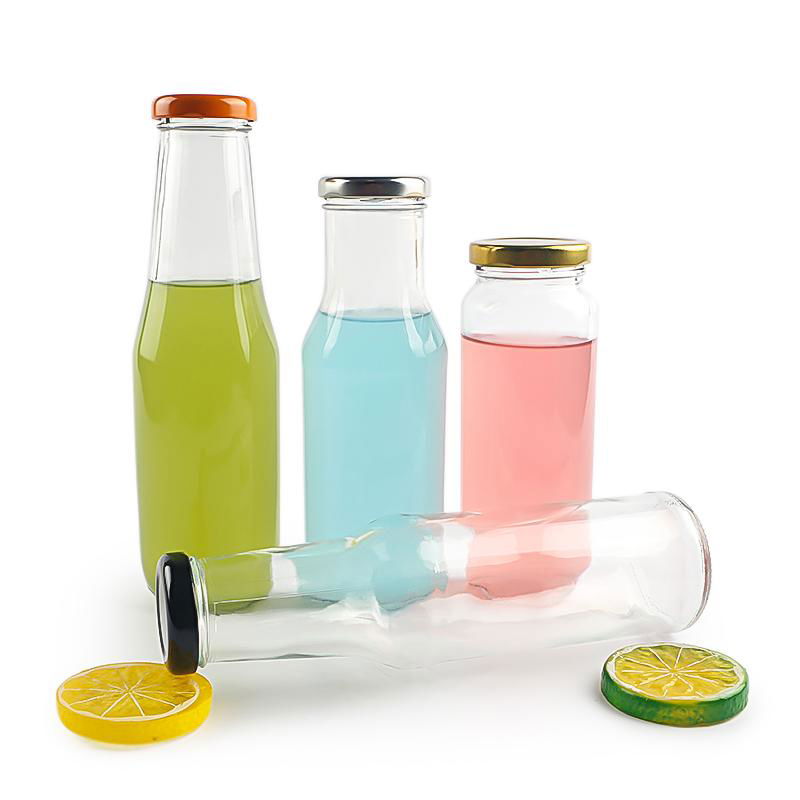 Empty clear glass tomato sauce beverage juice bottles with sealed metal cap 2