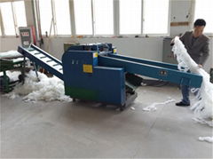 Fabric cutting machine/waste paper