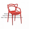 One-piece red plastic dining chair