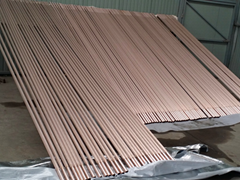 Carbon steel high flux tube with OD sintered porous coating