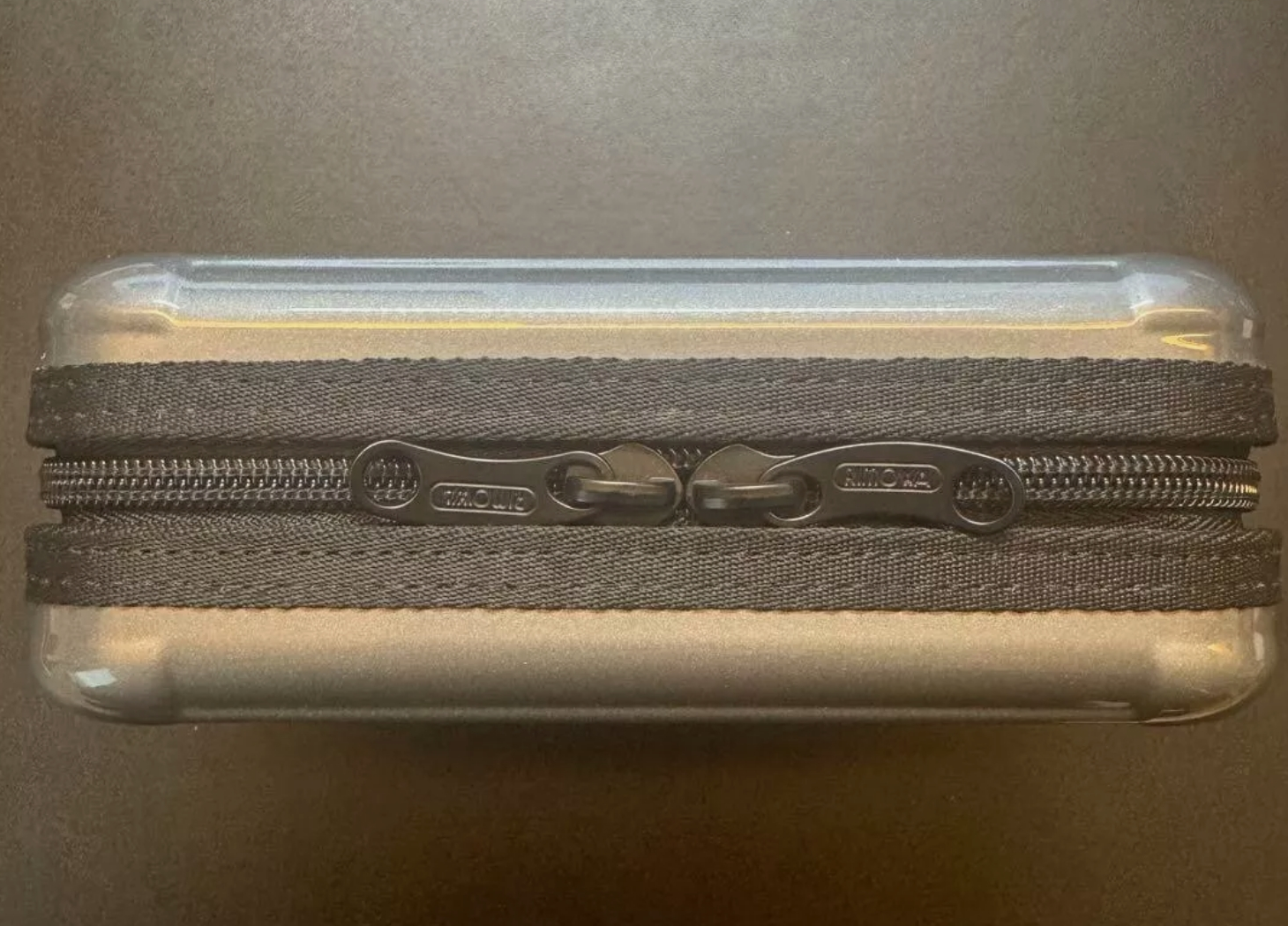 Rimowa EVA Airways First Class Travel Amenity Hard Case Gray Thai Airways Travel Case Pouch Silver