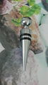 The pointy head is decorated with a round ball bottle stopper 1614023