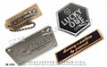 Brand clothing metal name label