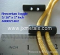 Ferrocerium toggle button or toggle fire starter