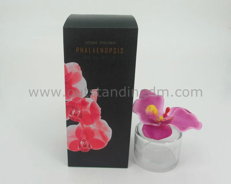 artificial flower with cotton stick in glass bottle with nice packing
