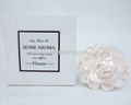 white ceramic flower in paper box for gift set