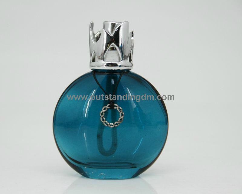 blue glass bottle with white zinc alloy cap