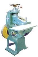 Raw material pressing machine