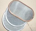 Stainless steel mesh disc wrapped with metal sheet