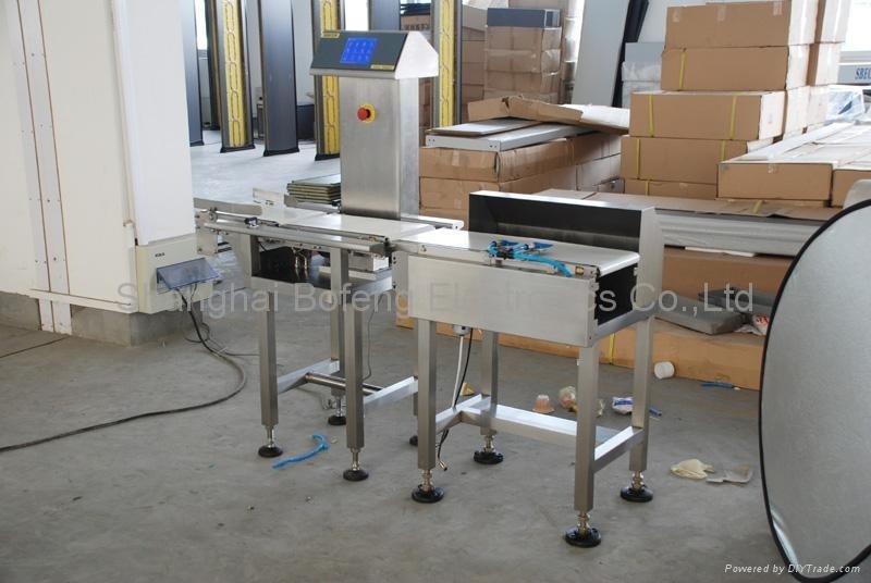 Check Weigher with Arm Type Rejection System