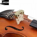 Four-clawed metal violin mute