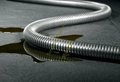 Protective hoses shield cables or tubes
