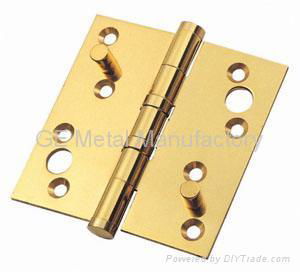 Brass hinge with security studs