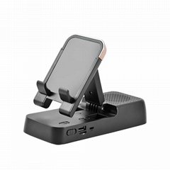 Mobile phone holder with bluetooth speaker
