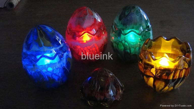 led candle in eggshaped glass-painting