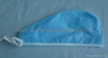 Disposable nonwoven surgical cap