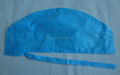 Disposable nonwoven surgical cap