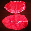 Disposable nonwoven shoe cover