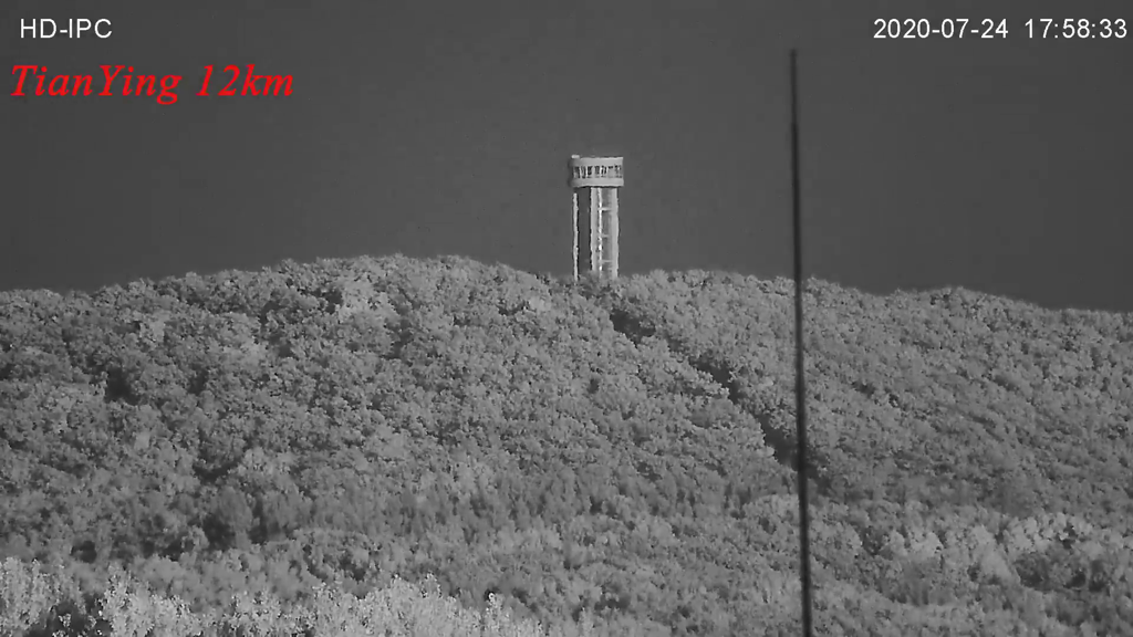 HD1200P 2MP 25~1200mm coaxial zoom no color aberration spotter SWIR CCTV camera see lightning rod on the watchtower at 1200mm focal length with defog