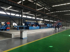 Large output full two roll aluminum rod continuous casting and rolling line