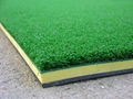 Yellow golf range mat