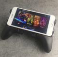 King of cell phone game controller glory wireless cooling game handle factory