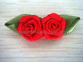 Red Rose bows with green leaf