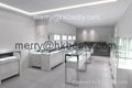 Glossy white jewelry shop design and