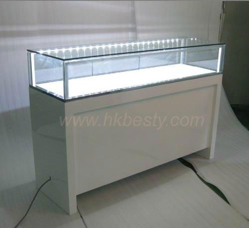 Glossy white jewelry showcases for jewelry store design