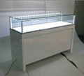 Glossy white jewelry showcases for