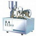 Tube filling and sealing machine 1