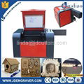 Economy mini desktop small cheap low cost laser engraving cutting machine price  2