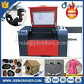 Economy mini desktop small cheap low cost laser engraving cutting machine price 