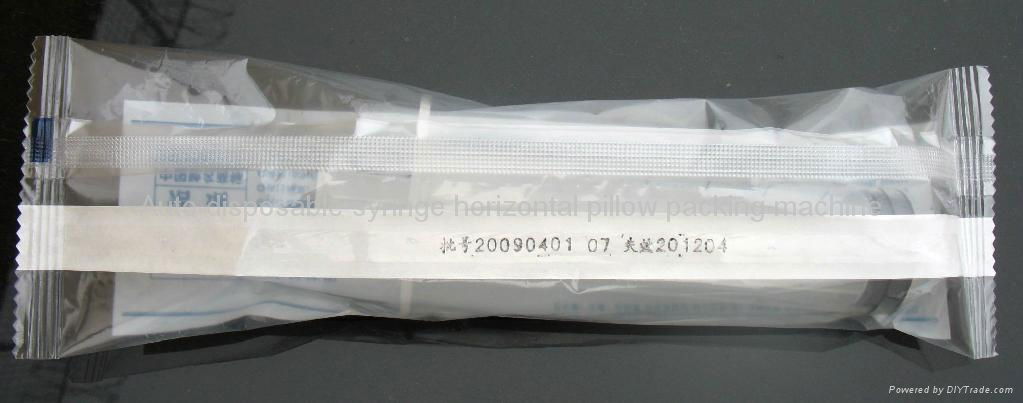 Auto disposable syringe horizontal pillow packing machine 2