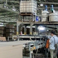 Laminated flooring production machines