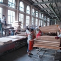 Laminated flooring production machines