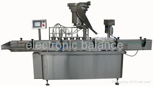 Vial liquid filling, stoppering and capping machine  2