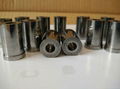 Alloy bushing insert