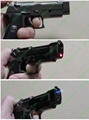 Gun style cigerettes lighter with a 5mw red laser pointer sight FREE SHIPPING